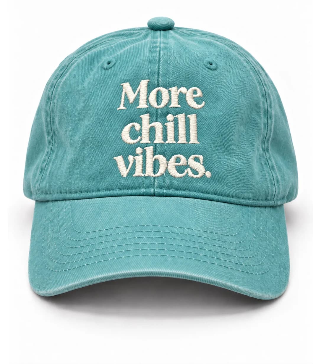 Gorra FML en cian deslavado, con frase More chill vibes.